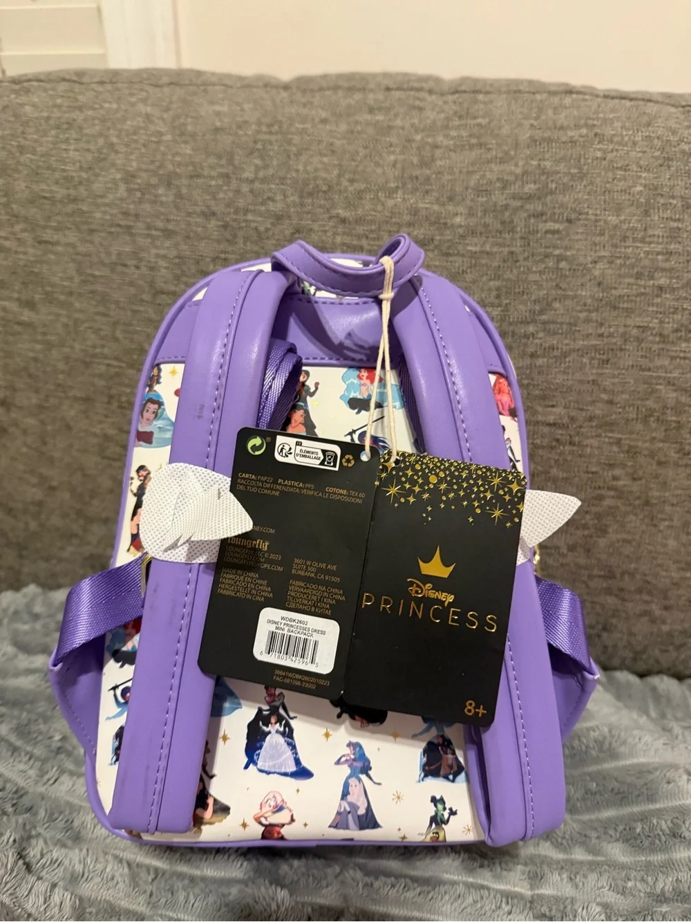 Loungefly White Mini Backpack with Purple Trim and Multicolor Princess Art